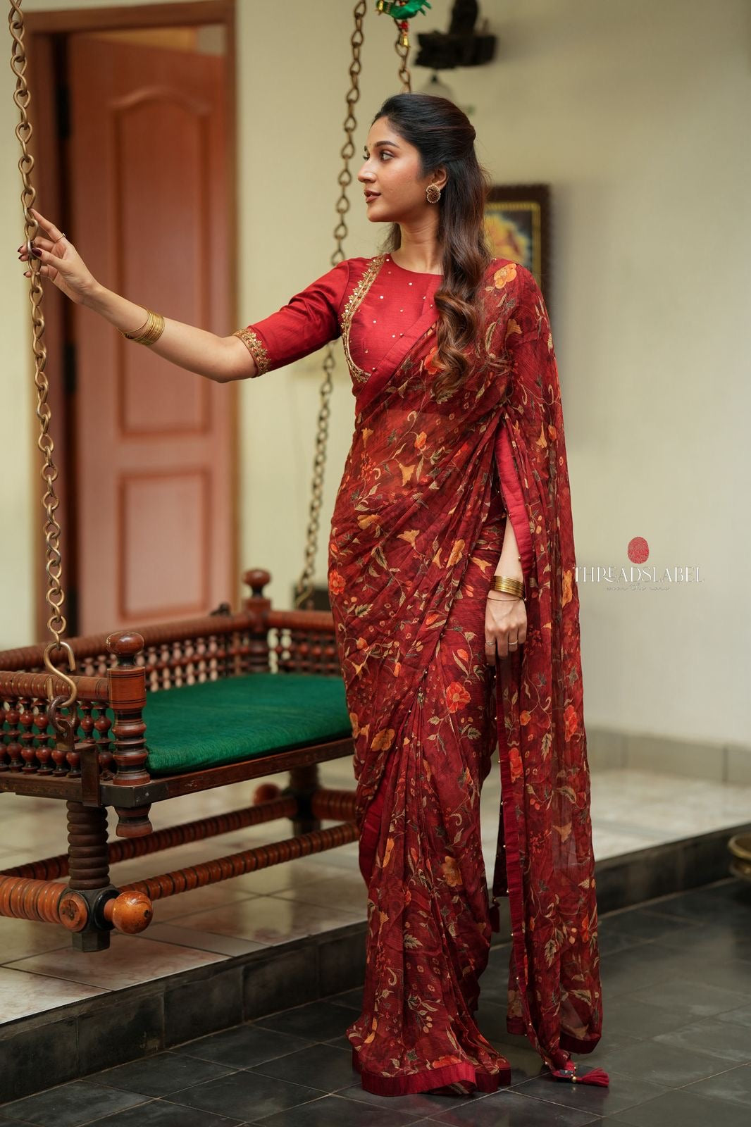 Maroon chiffon floral saree with hand work blouse