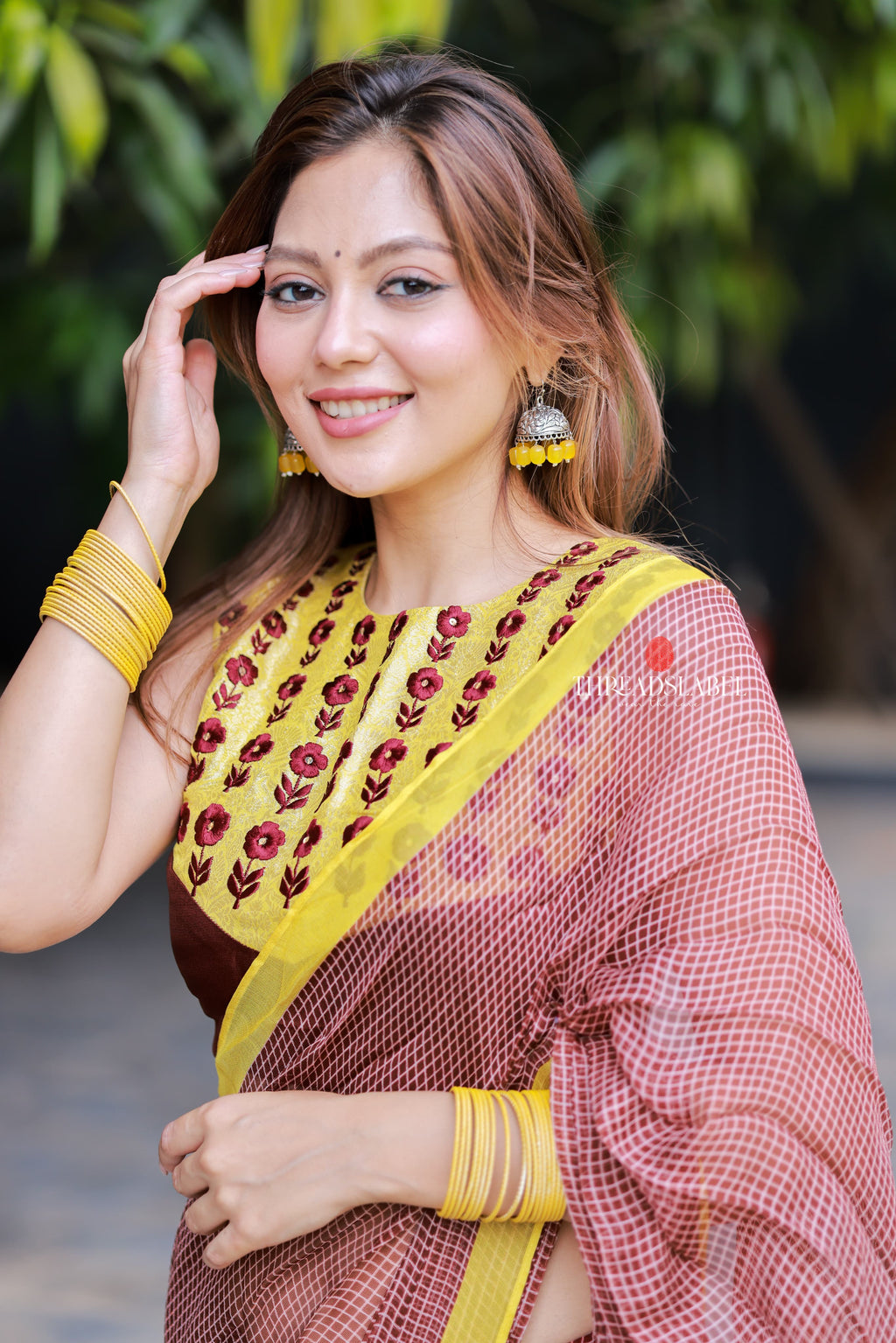 Brown jute saree with banarasi hand work blouse