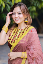Brown jute saree with banarasi hand work blouse