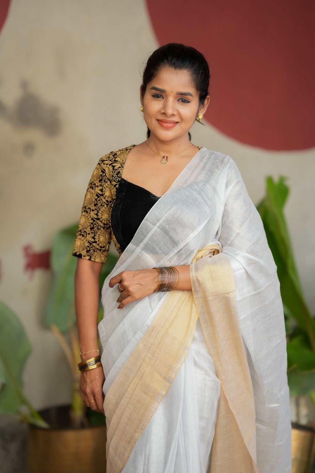 White soft tissue saree with heavy embroidery blouse