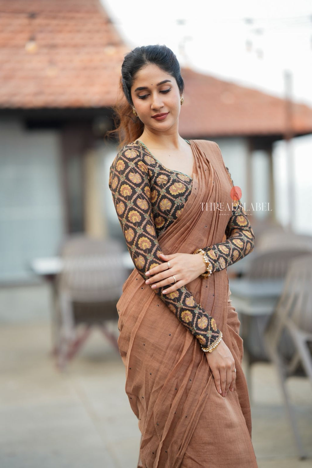 Brown malai chanderi saree with Ajrak print blouse