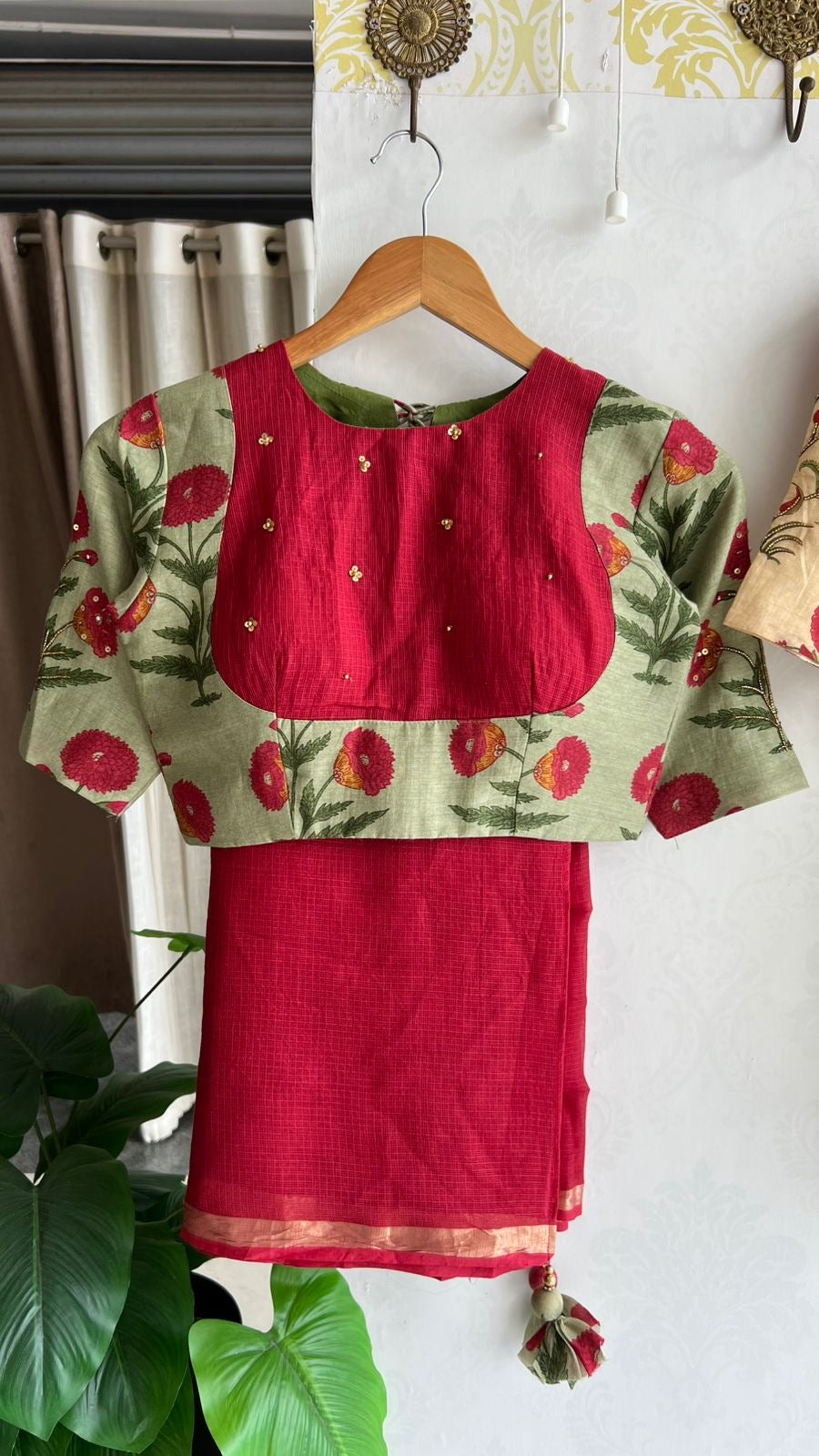 Maroon pure kota saree with green hand work blouse