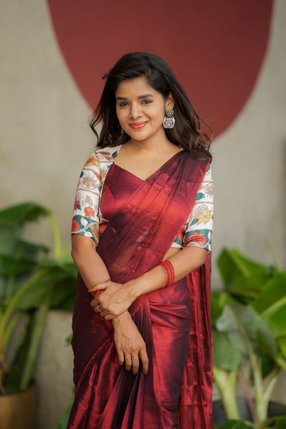 Wine soft tissue saree with floral blouse