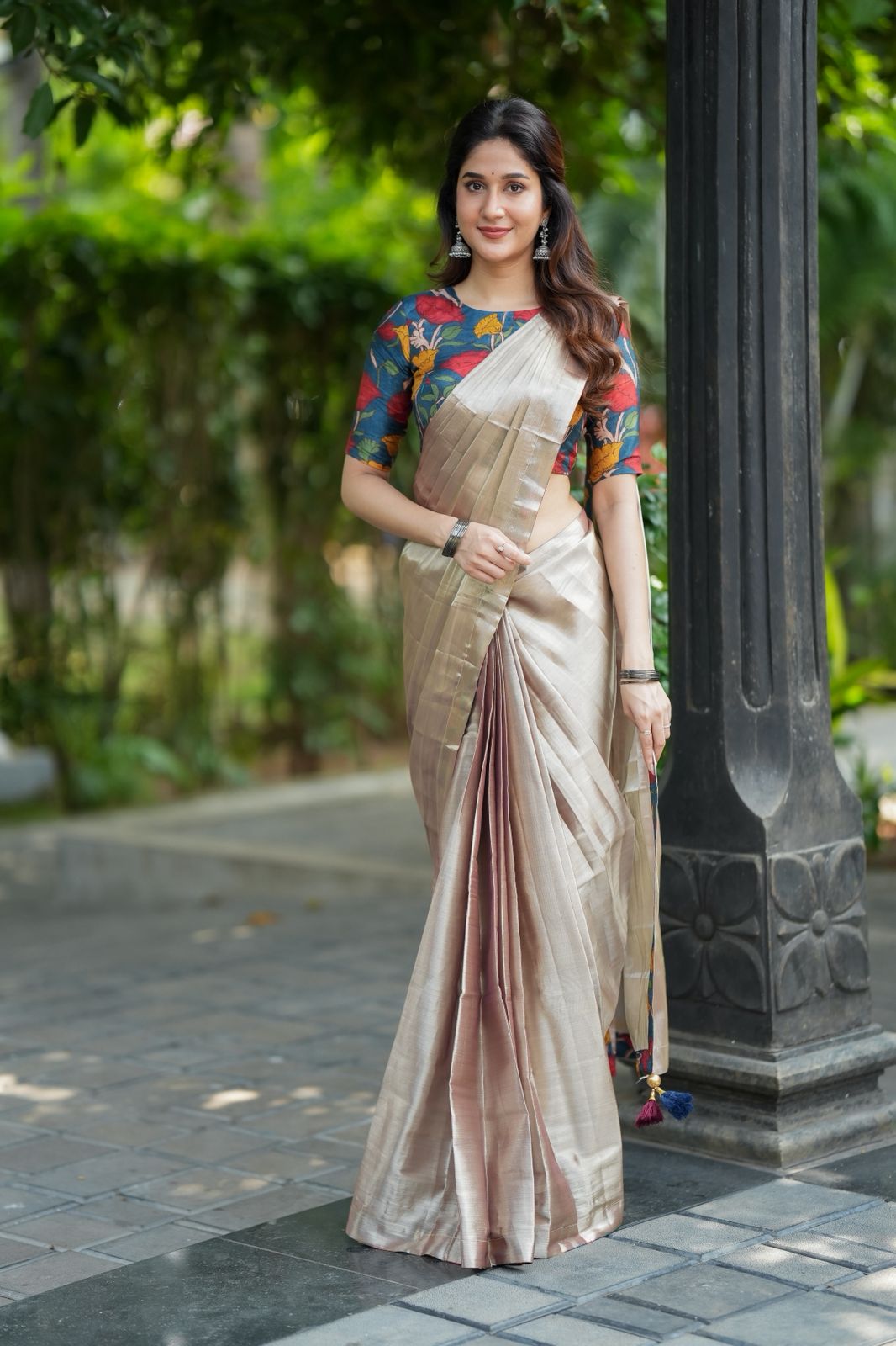 Silver soft tissue saree with blue kalamakari blouse