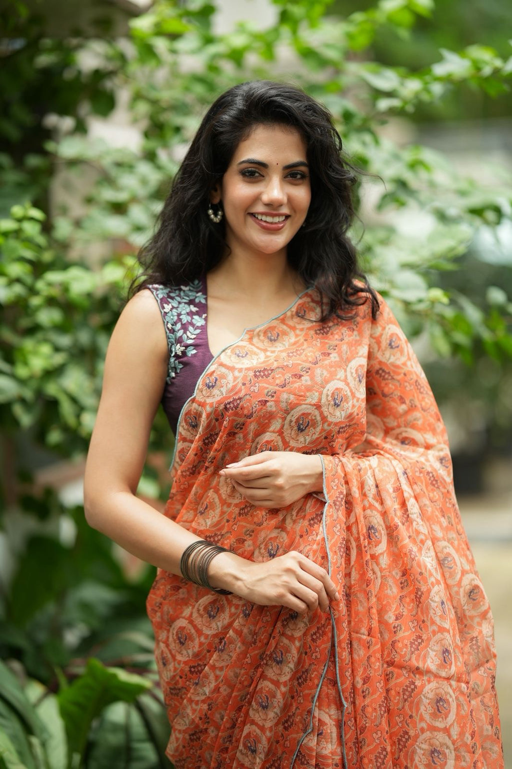 Pastel peach chiffon saree with brown hand work blouse