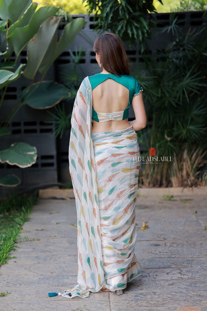Cream chiffon paisley saree with hand work blouse