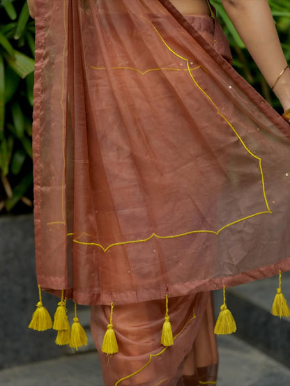 Brown soft organza saree with lime green ikkat blouse