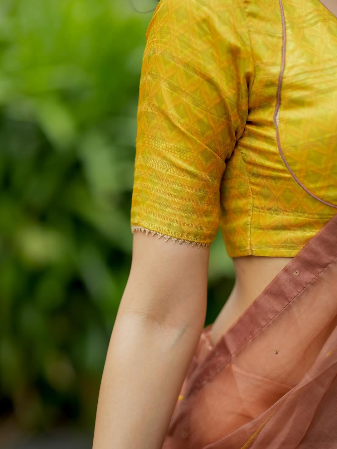 Brown soft organza saree with lime green ikkat blouse