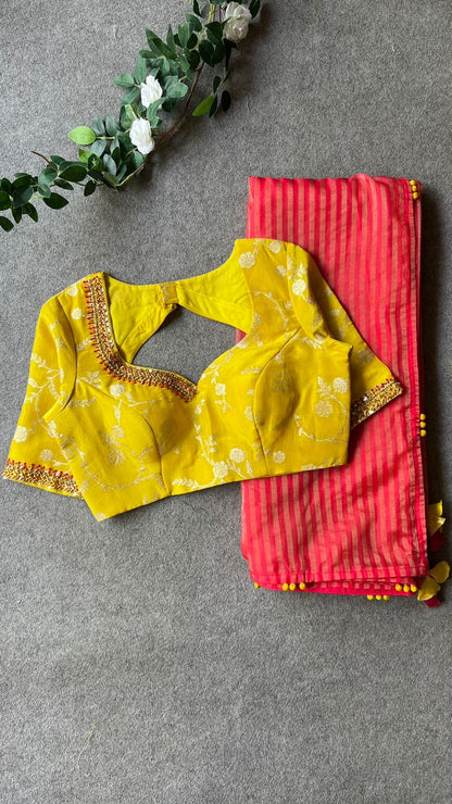 Pink stripped tissue saree with yellow floral hand work blouse