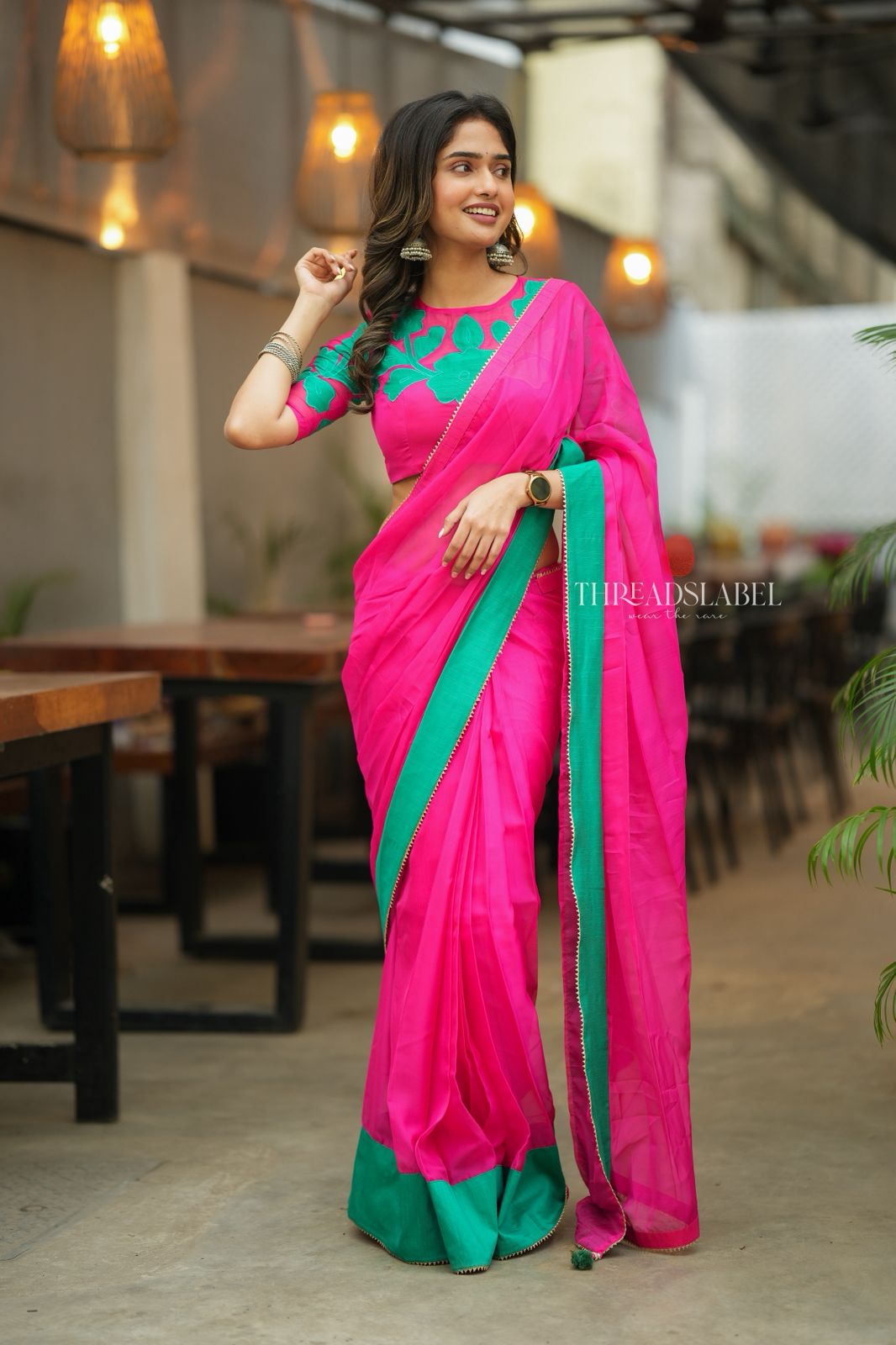 Pink organza saree with floral hand work blouse