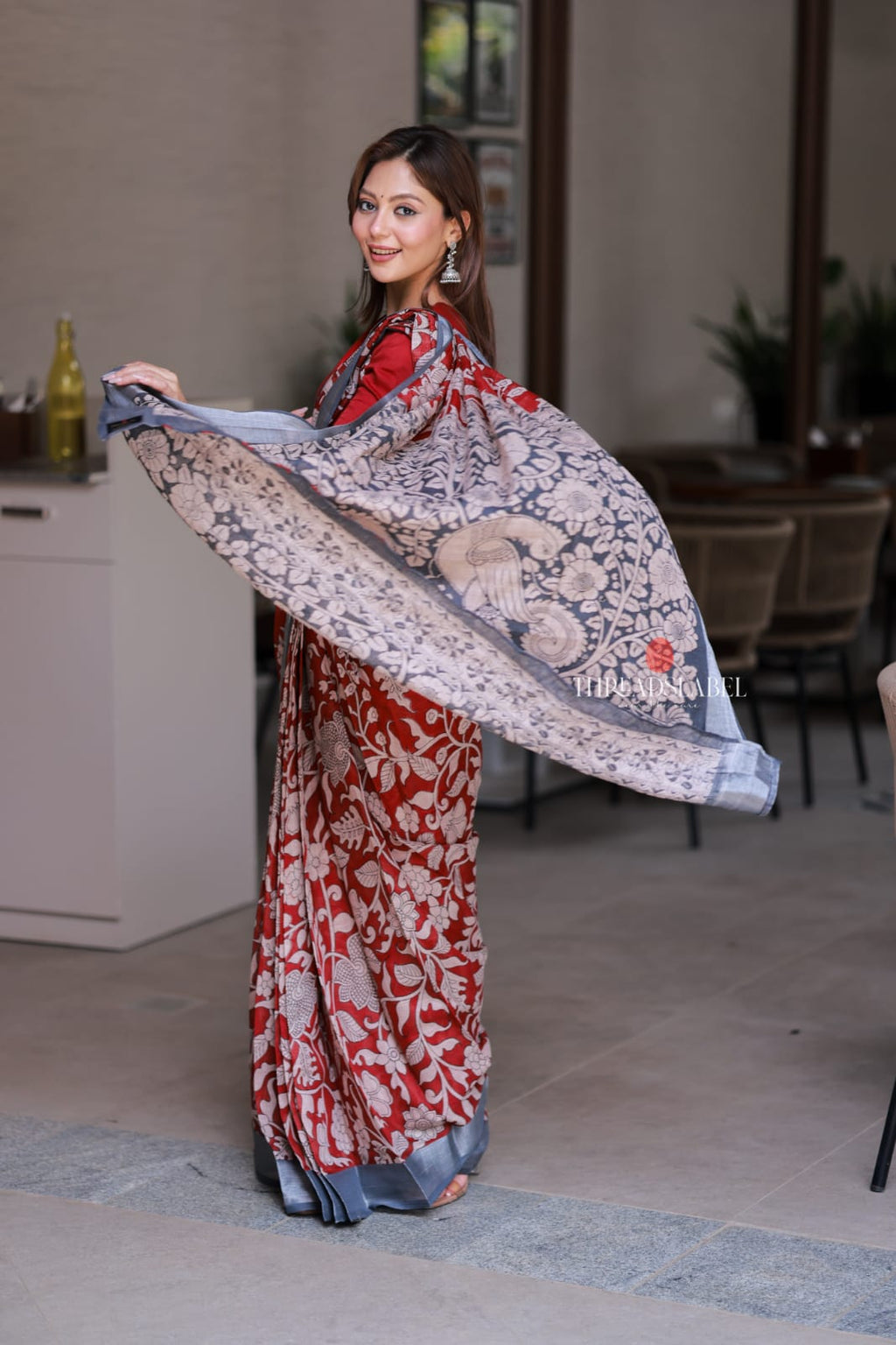 Reddish maroon linen cotton kalamkari saree with embroidery blouse