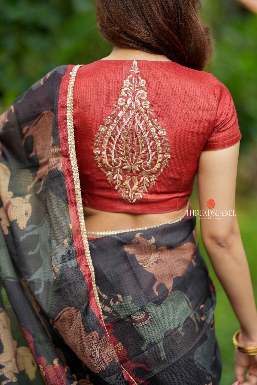 Black cow kota saree with paisley hand work blouse