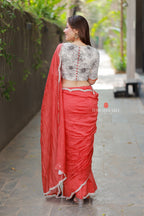 Orange rust saree with pearl work blouse