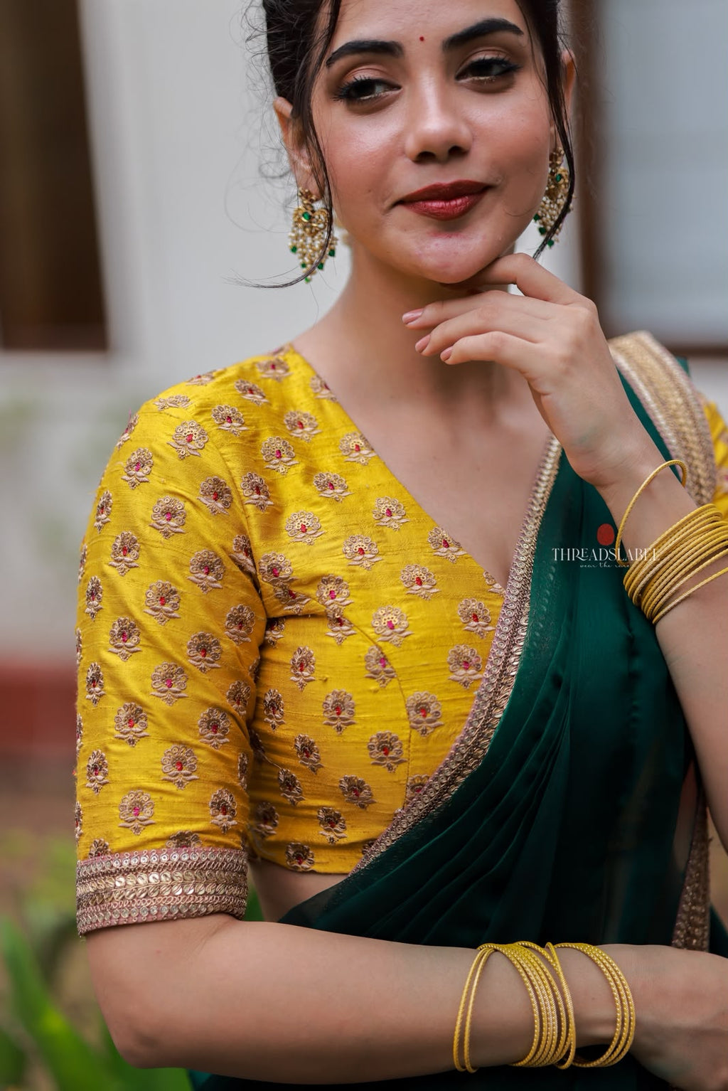 Green organza saree with yellow hand work blouse