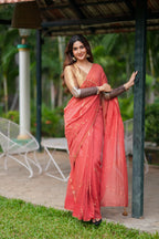Orange rust saree with tissue handwork blouse