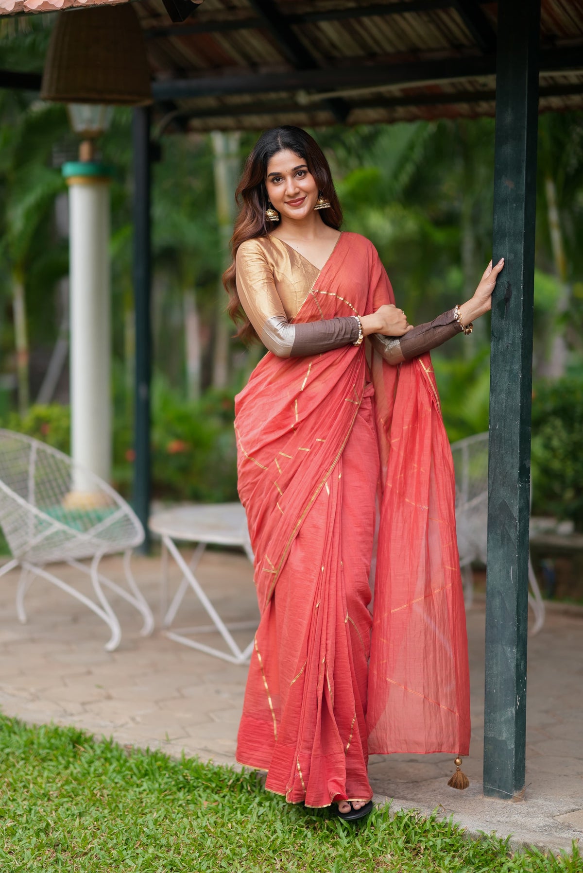 Orange rust saree with tissue handwork blouse