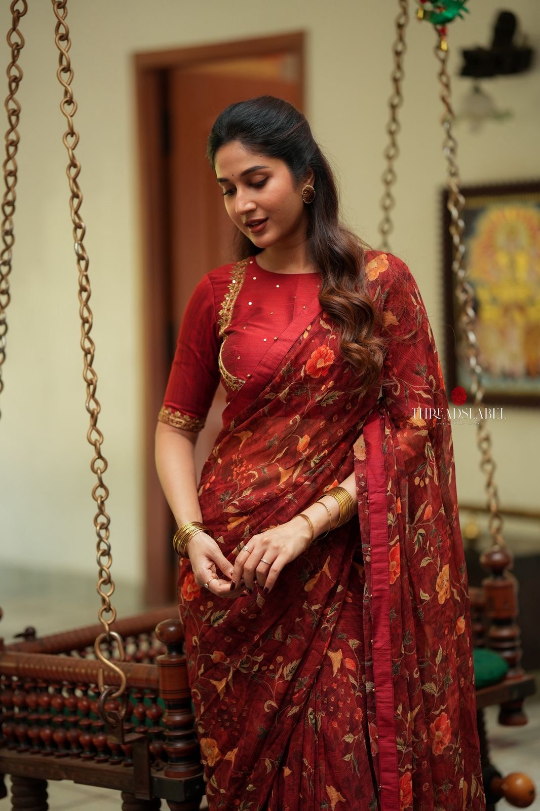 Maroon chiffon floral saree with hand work blouse