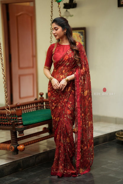 Maroon chiffon floral saree with hand work blouse
