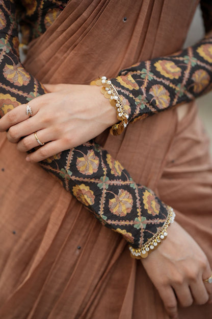 Brown malai chanderi saree with Ajrak print blouse