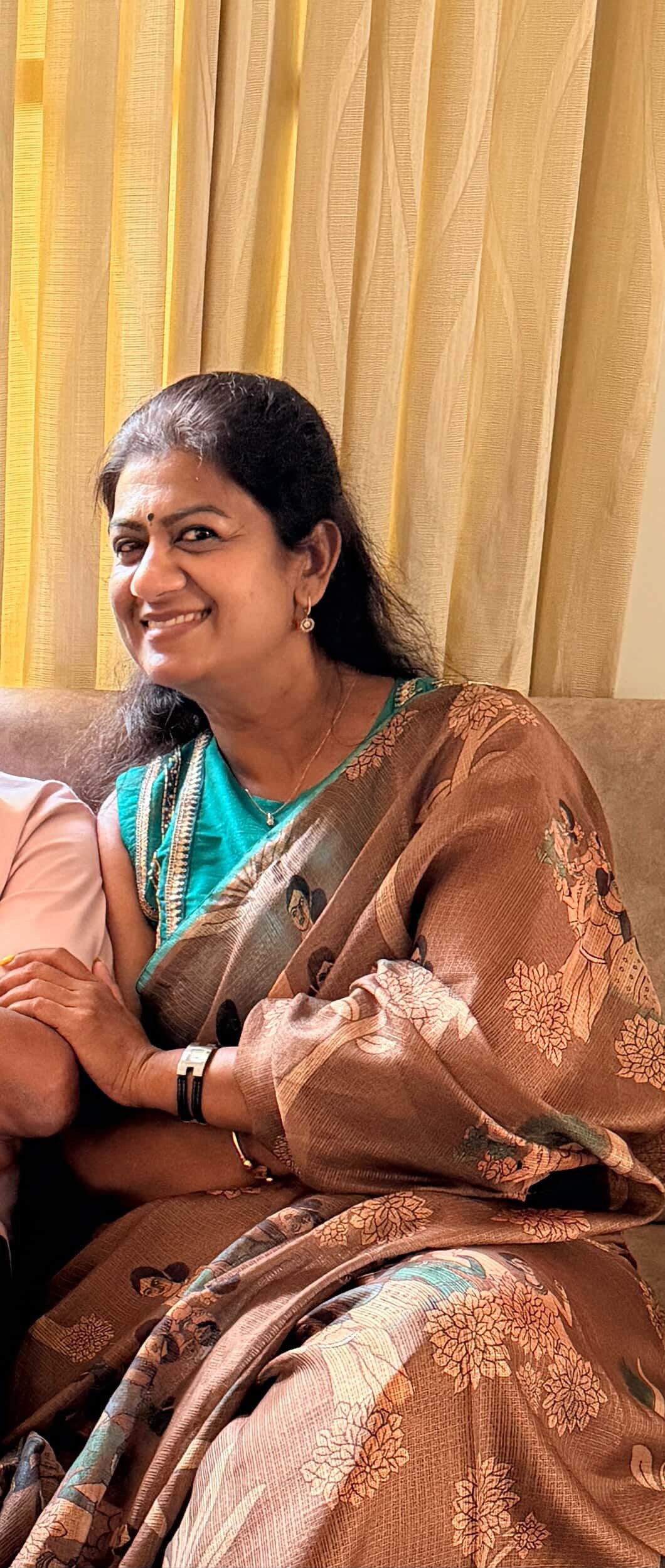 Brown kalamkari kota saree with blue hand work blouse