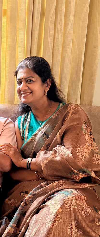 Brown kalamkari kota saree with blue hand work blouse