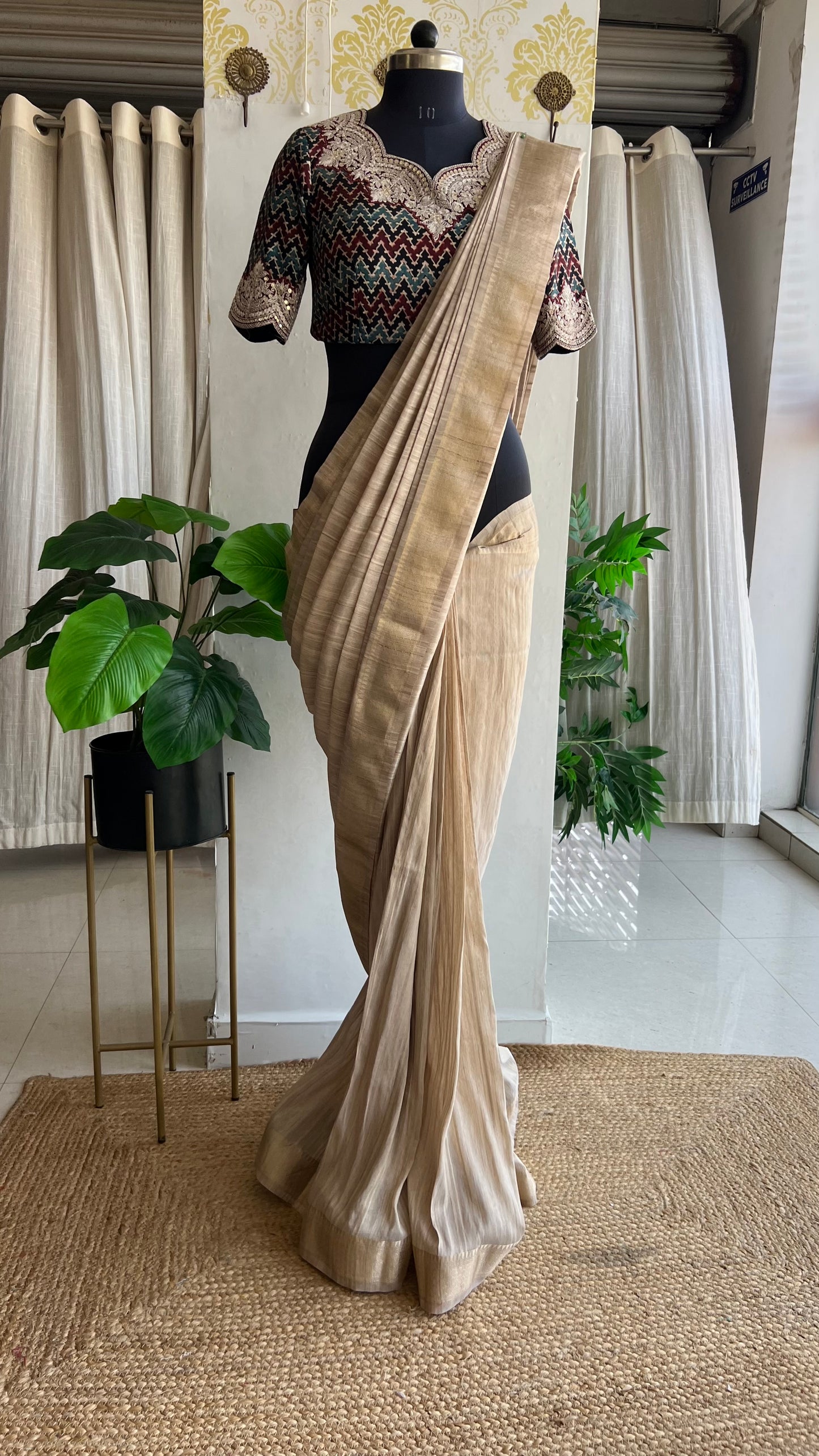 Golden cream tissue saree with ajrak embroidery blouse