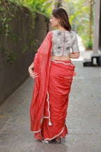 Orange rust saree with pearl work blouse