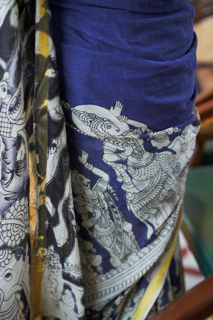 Purple kota saree with kalamkari work blouse