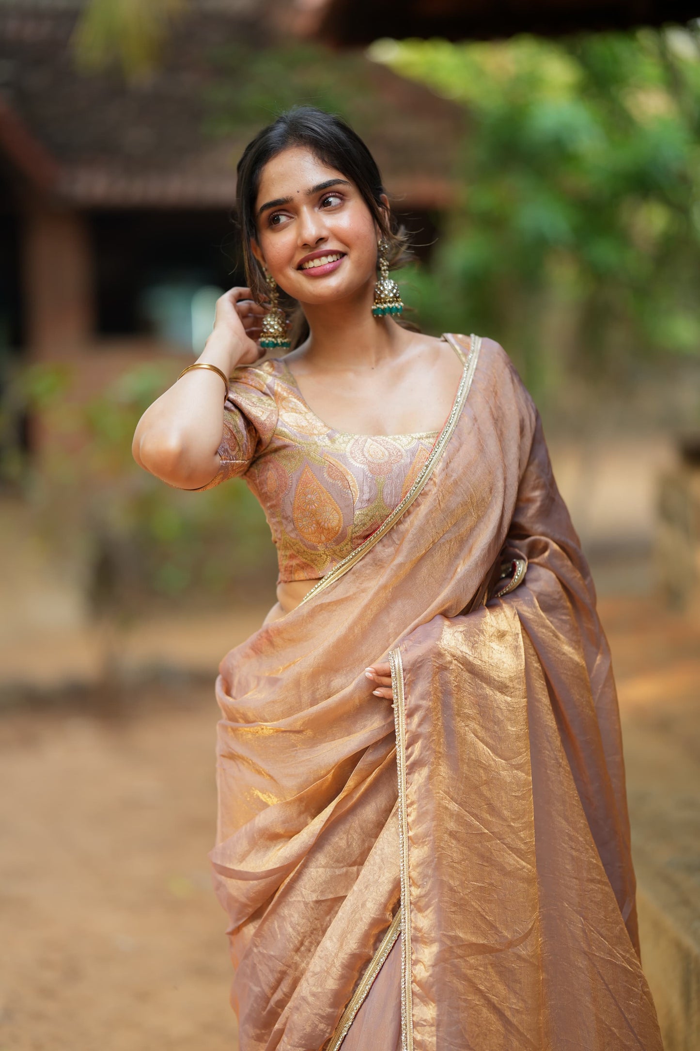 Golden peach glass tissue saree with banarasi blouse