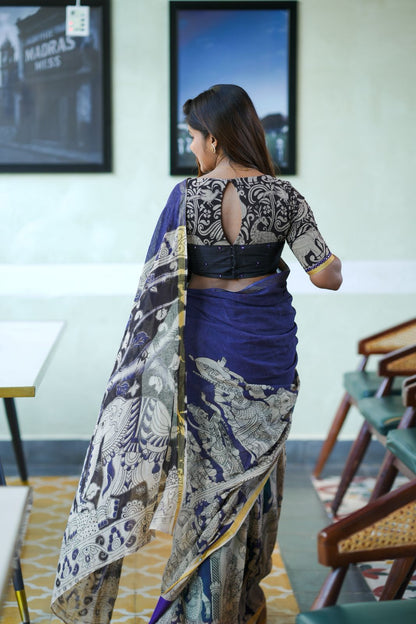 Purple kota saree with kalamkari work blouse