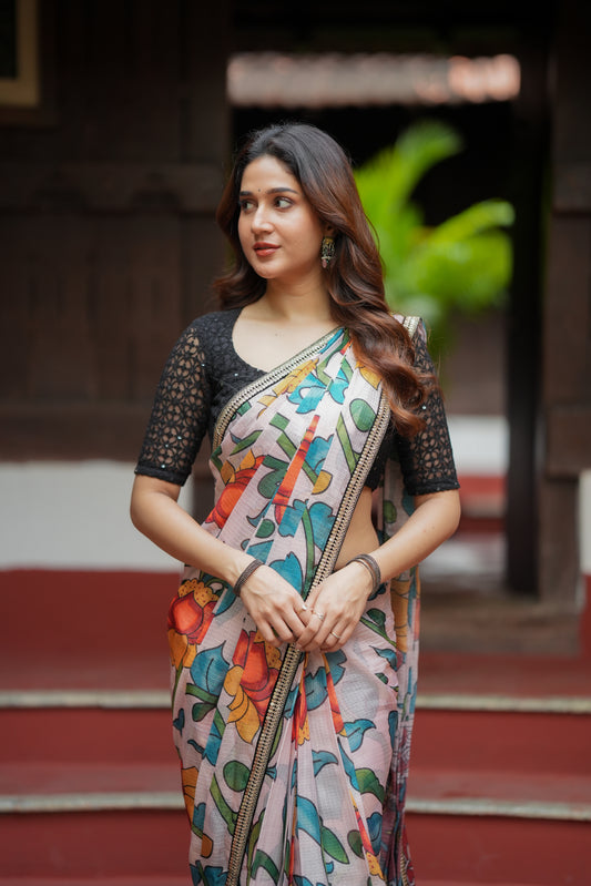 Half white floral kota saree with black embroidered blouse