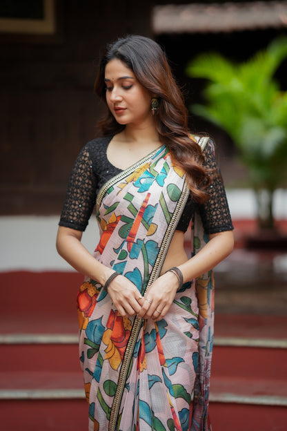 Half white floral kota saree with black embroidered blouse