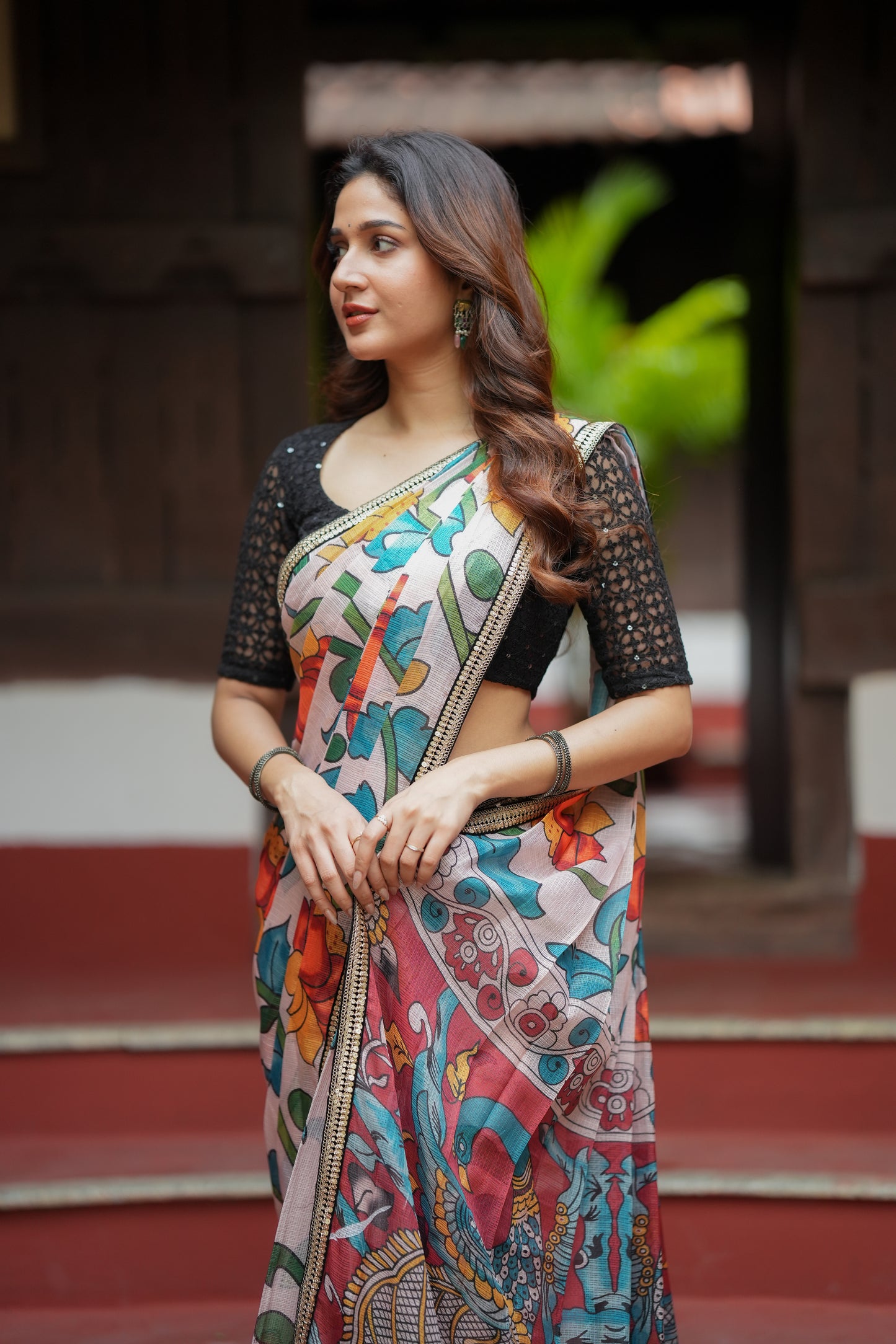 Half white floral kota saree with black embroidered blouse