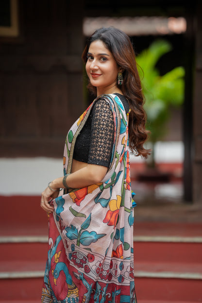 Half white floral kota saree with black embroidered blouse