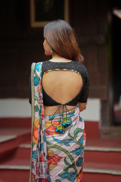 Half white floral kota saree with black embroidered blouse