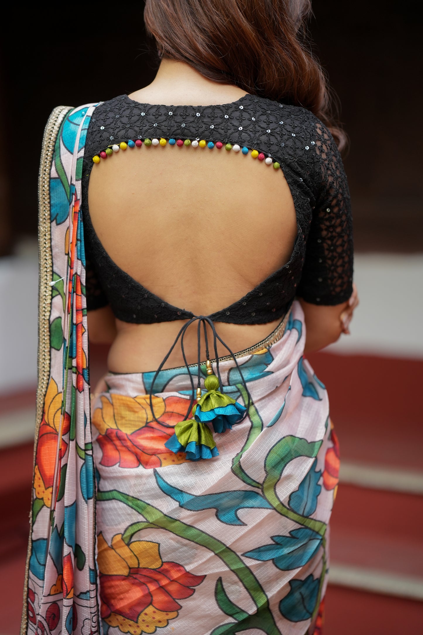 Half white floral kota saree with black embroidered blouse