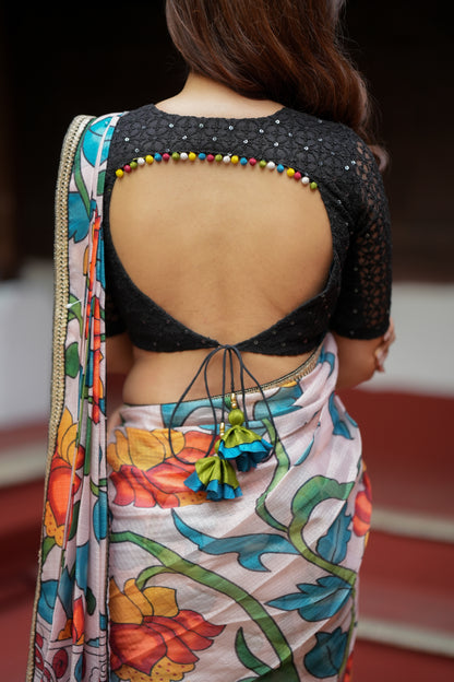 Half white floral kota saree with black embroidered blouse