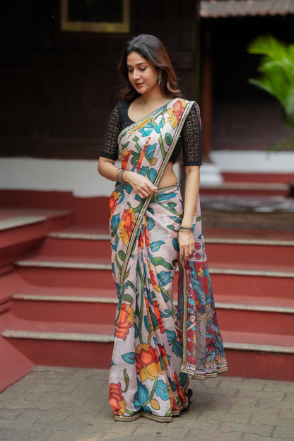 Half white floral kota saree with black embroidered blouse