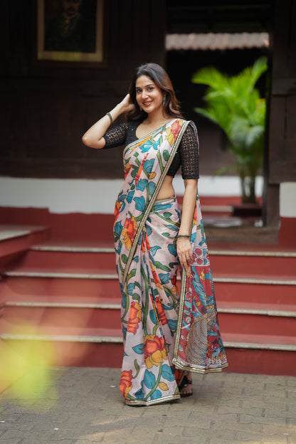 Half white floral kota saree with black embroidered blouse