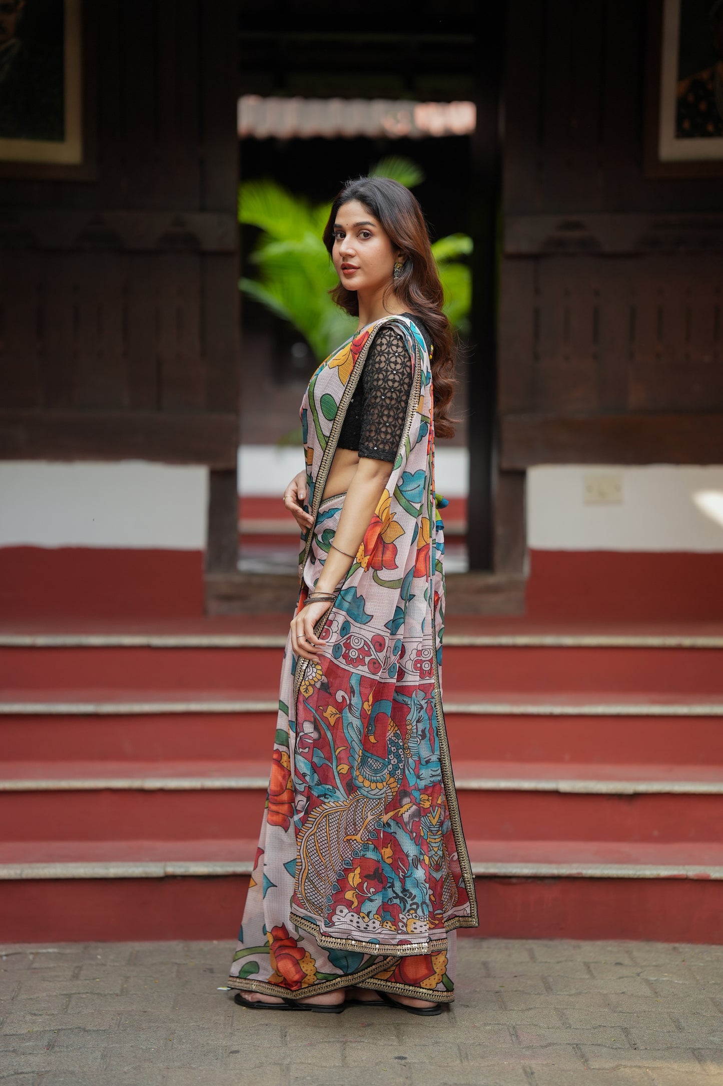 Half white floral kota saree with black embroidered blouse