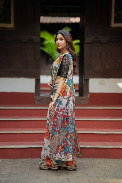 Half white floral kota saree with black embroidered blouse