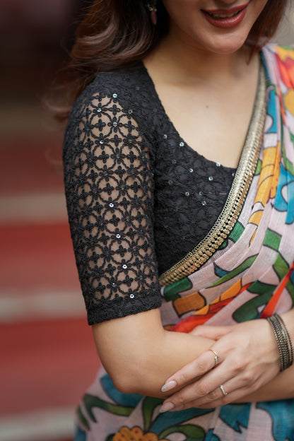 Half white floral kota saree with black embroidered blouse