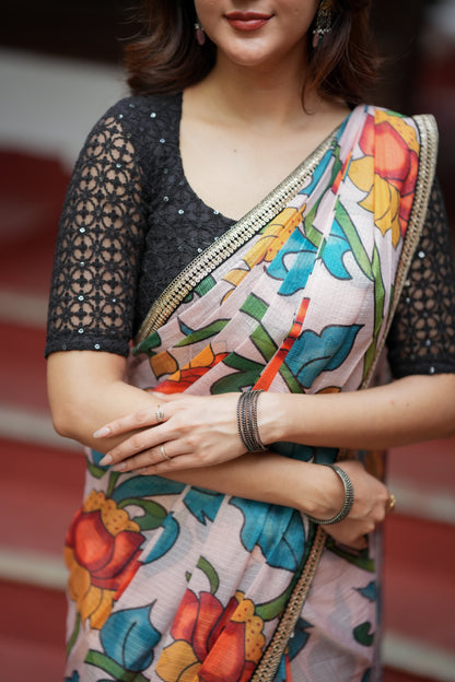 Half white floral kota saree with black embroidered blouse
