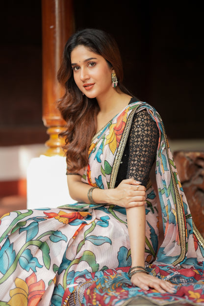 Half white floral kota saree with black embroidered blouse
