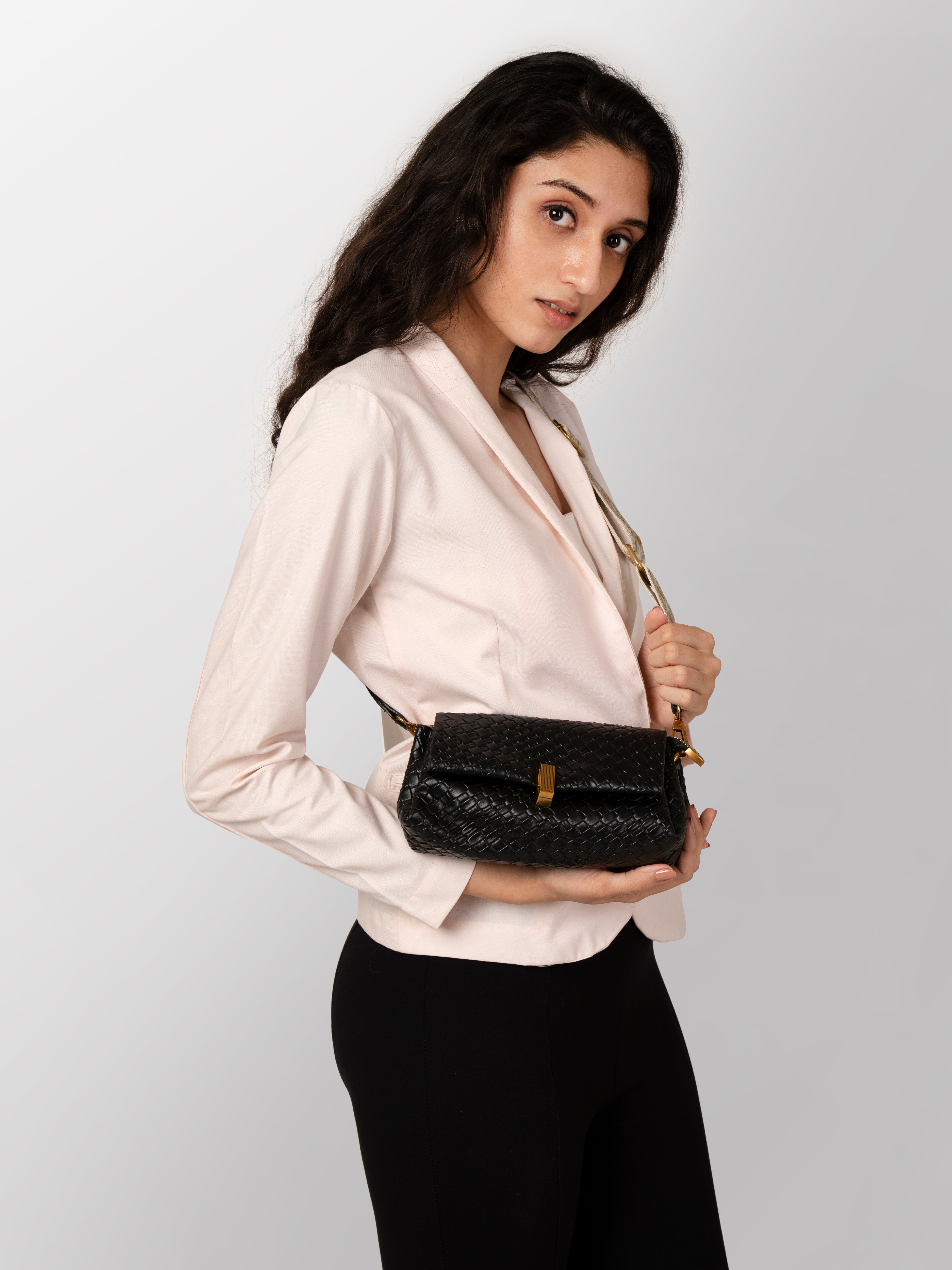 Women black textured hand bag