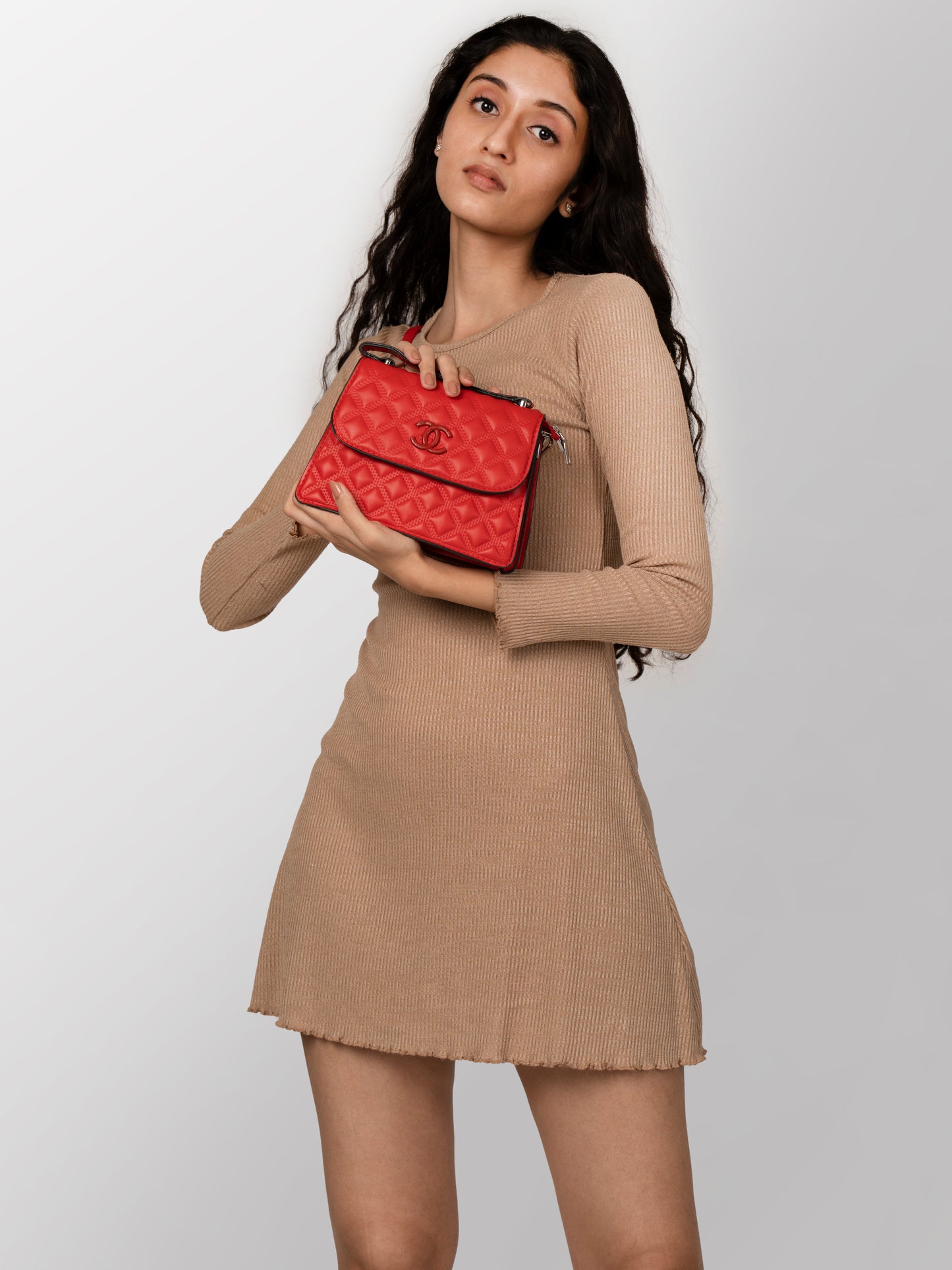 Women red textured fashion bag