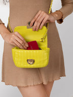 Women textured lime sling bag