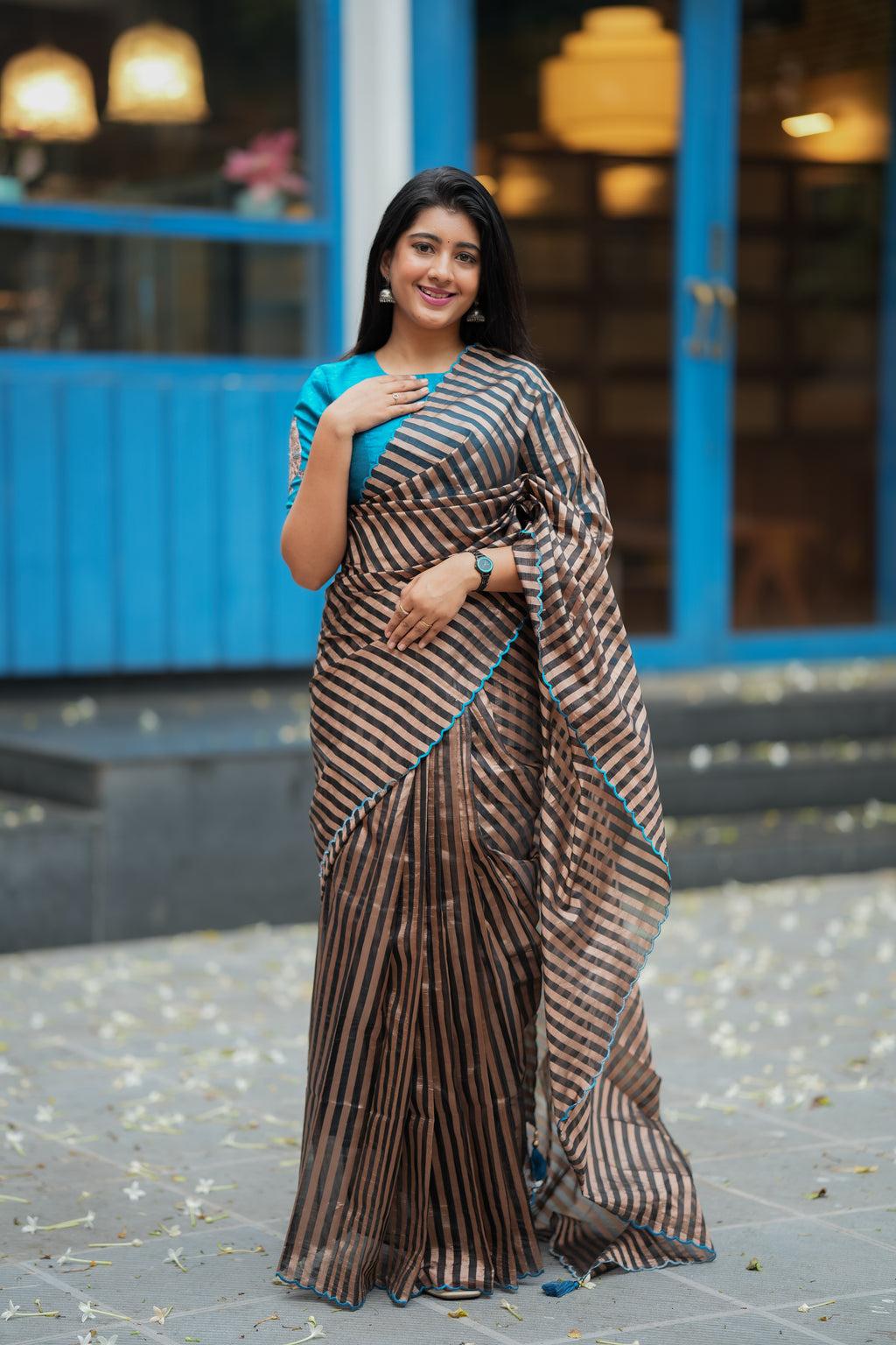 Black & copper stripped tissue saree with bird work blouse