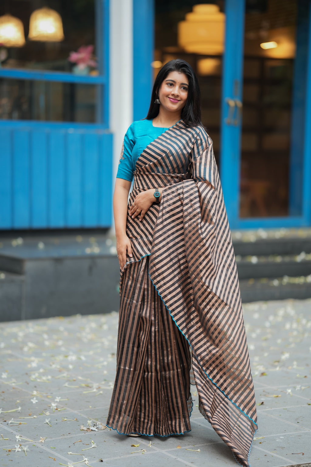 Black & copper stripped tissue saree with bird work blouse