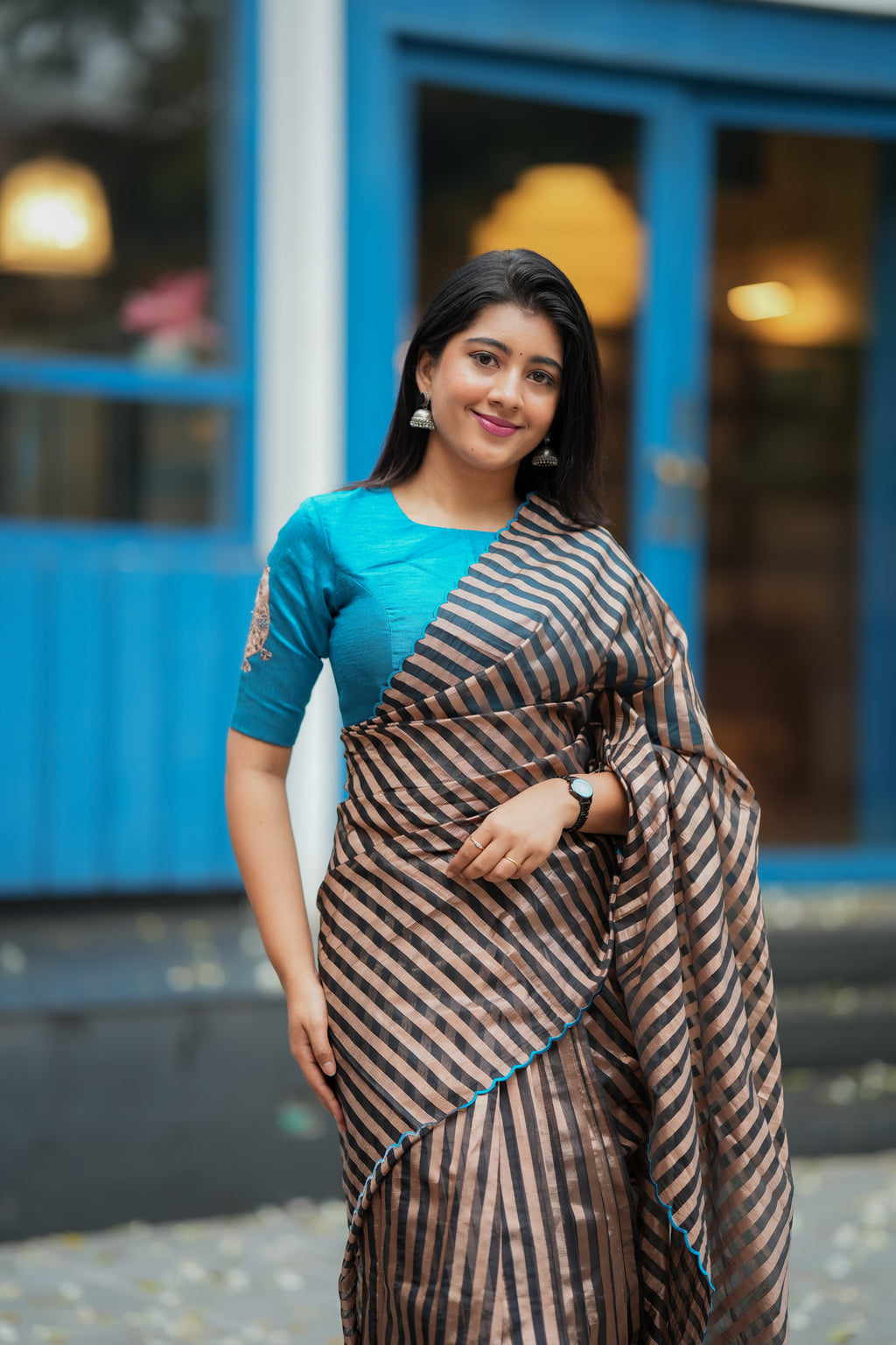Black & copper stripped tissue saree with bird work blouse